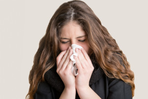 Sick Woman Sneezing